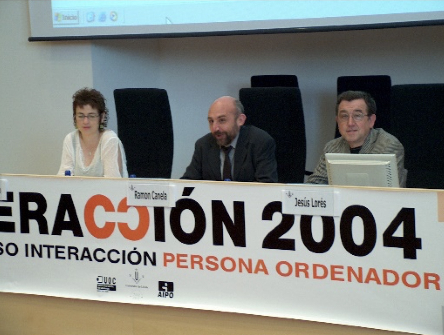 Mesa de autoridades de la sesión de clausura del congreso Interacción2004. Raquel navarro, Ramón Canela y Jesús Lorés